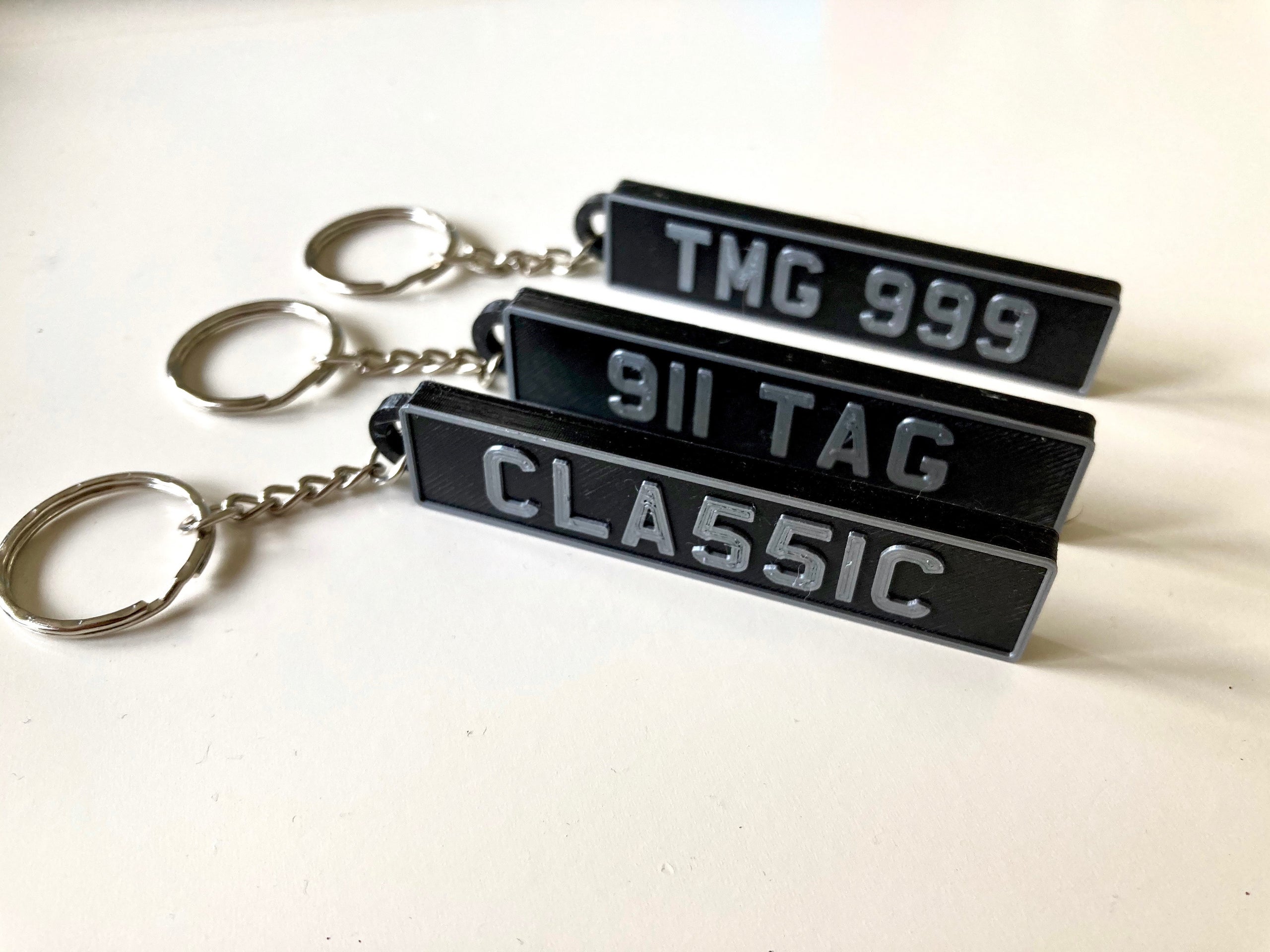 Keychain with number plate top